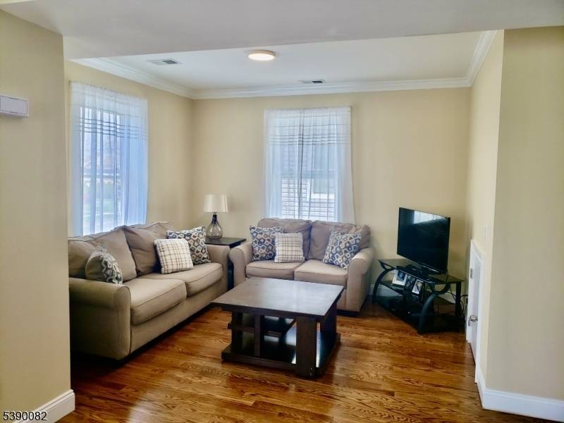 Don't miss your chance to live in this sun drenched unit in a multi family building in downtown Montclair.