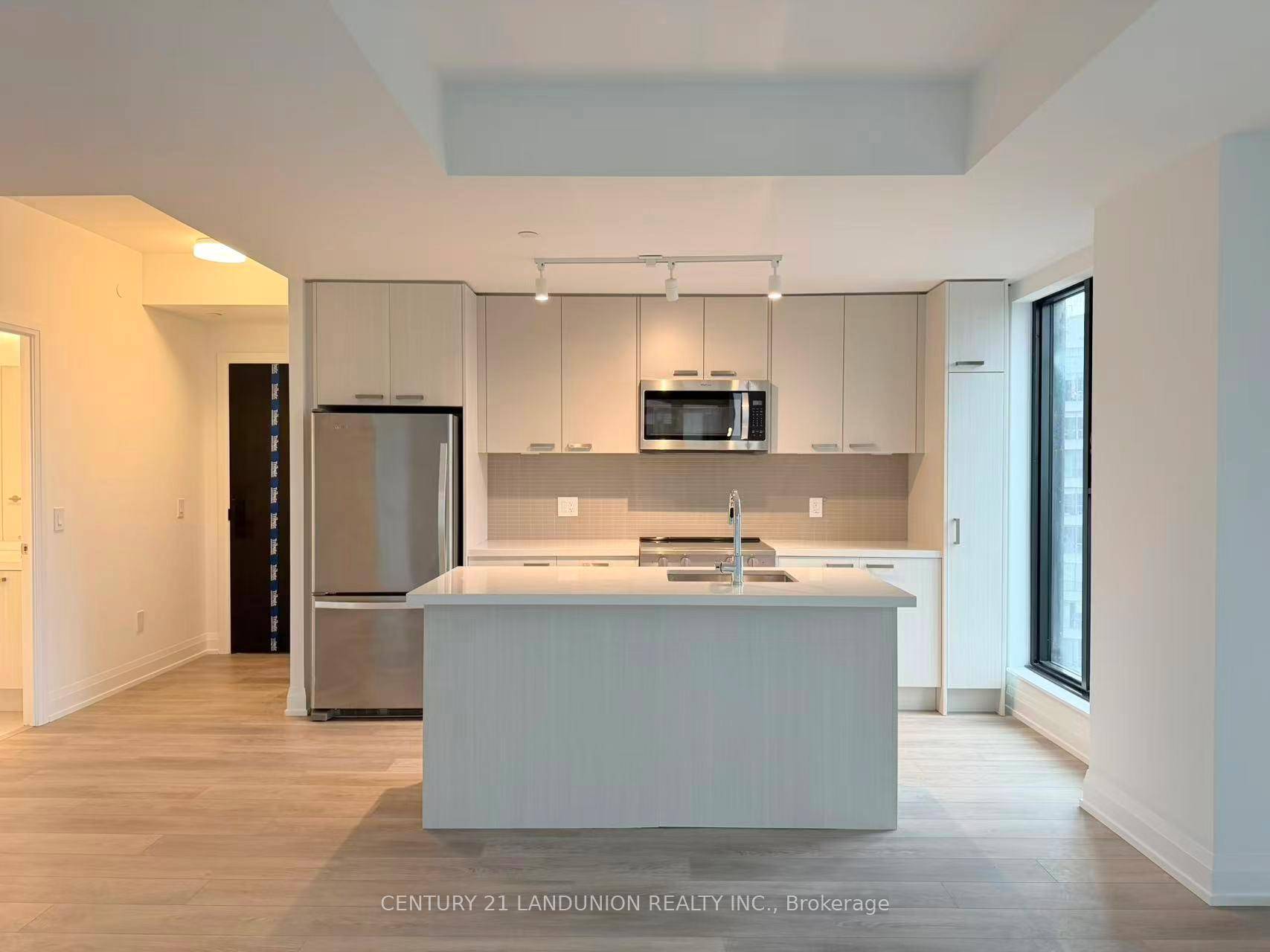 Modern Living in the Heart of MidtownExperience contemporary urban life at its best in this bright corner suite at Y amp ; S Condos.