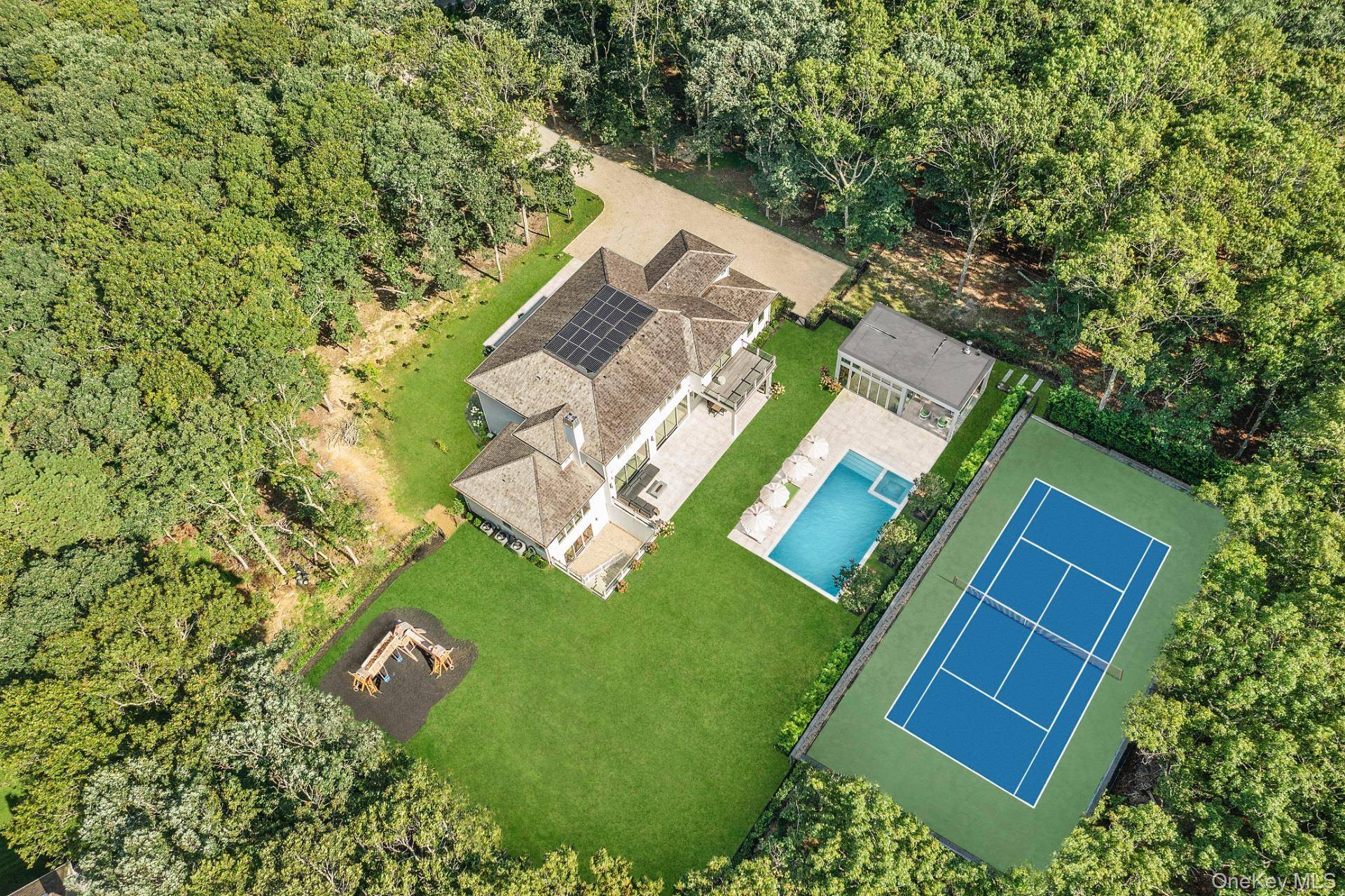 Exquisitely designed and move in ready, this spectacular new construction modern estate is set on 2.