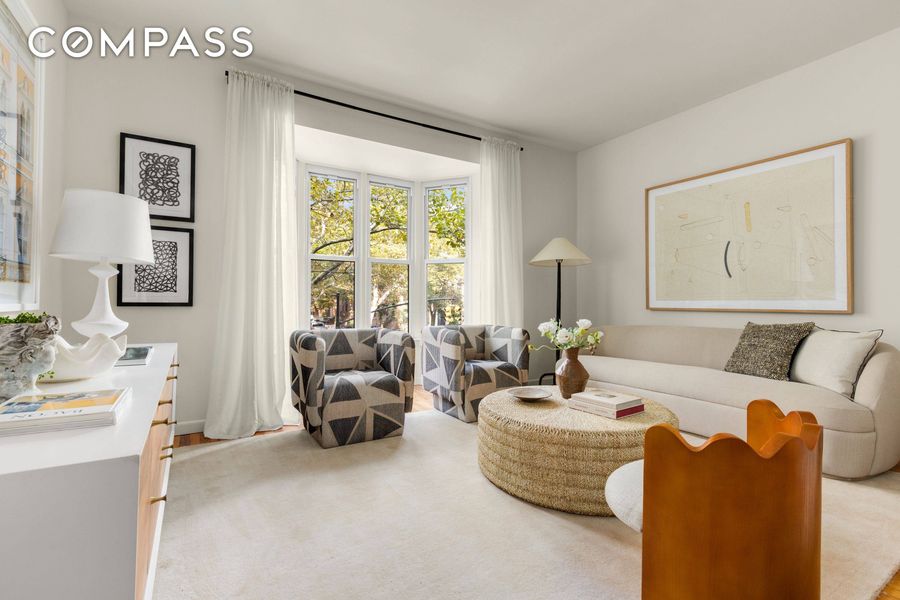 A sun filled four bedroom, two bathroom home with three exposures, lush treetop views, and an ideal layout awaits in the heart of Cobble Hill.