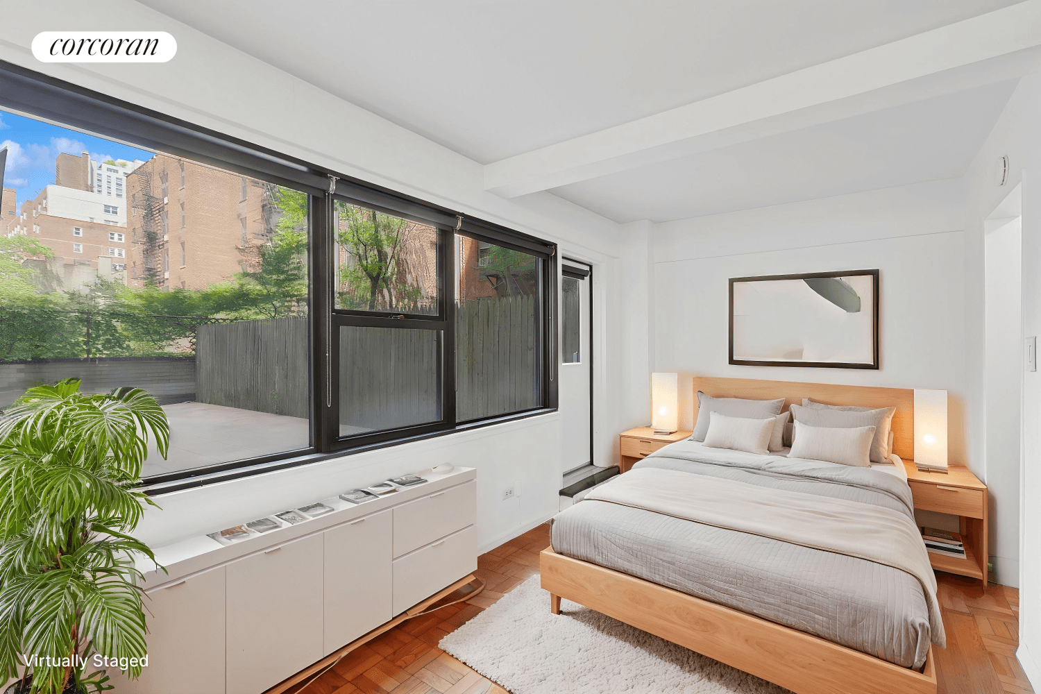 Enjoy peaceful and serene living from this courtyard alcove studio with grand sun drenched patio, ideally located in the desirable Upper East Side.
