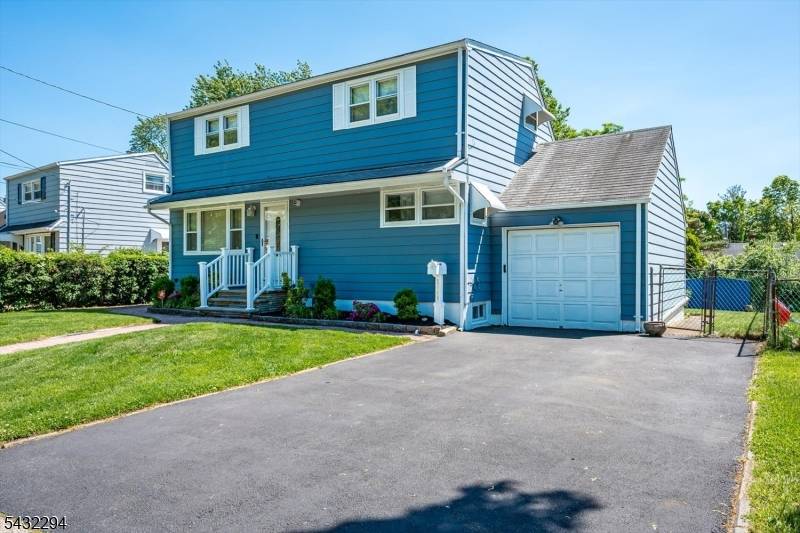 Welcome to this charming home nestled on a beautiful tree lined street.