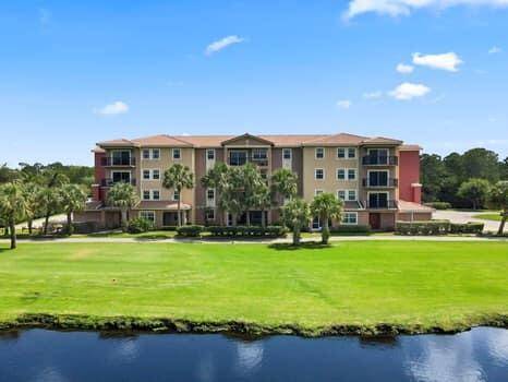 DELIGHT IN THIS SHARP CONTEMPORARY 3 BEDROOM 2 1 2 BATH CONDO WITH A GARAGE AND FANTASTIC LAKE GOLF VIEWS.