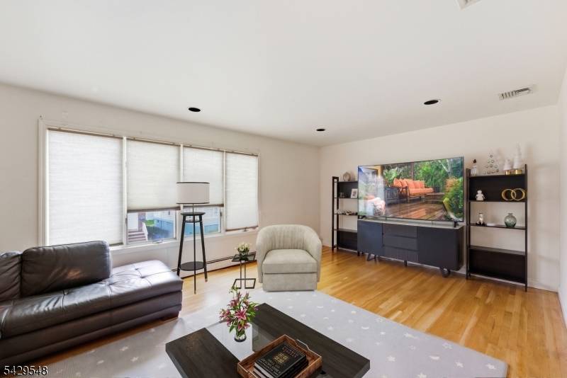High Performing 2 Family with Bonus Income Potential Spacious 3BR Units NYC Commute.