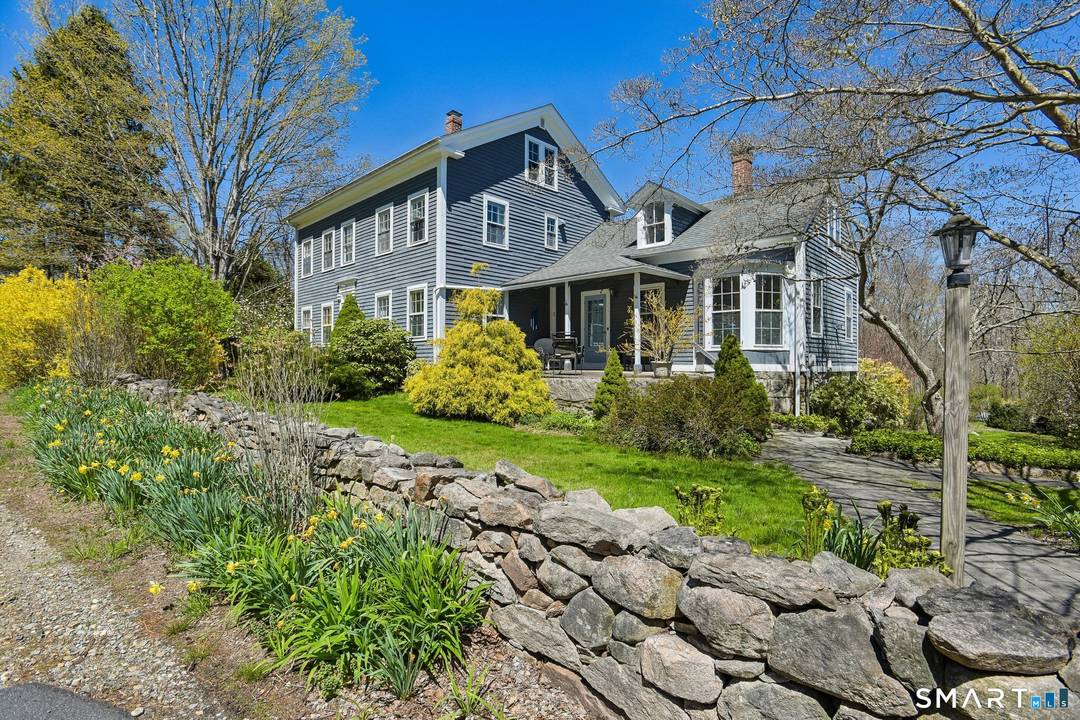 Located in Stonington, 1246 Pequot Trail is a timeless treasure that perfectly blends historic charm with modern potential.