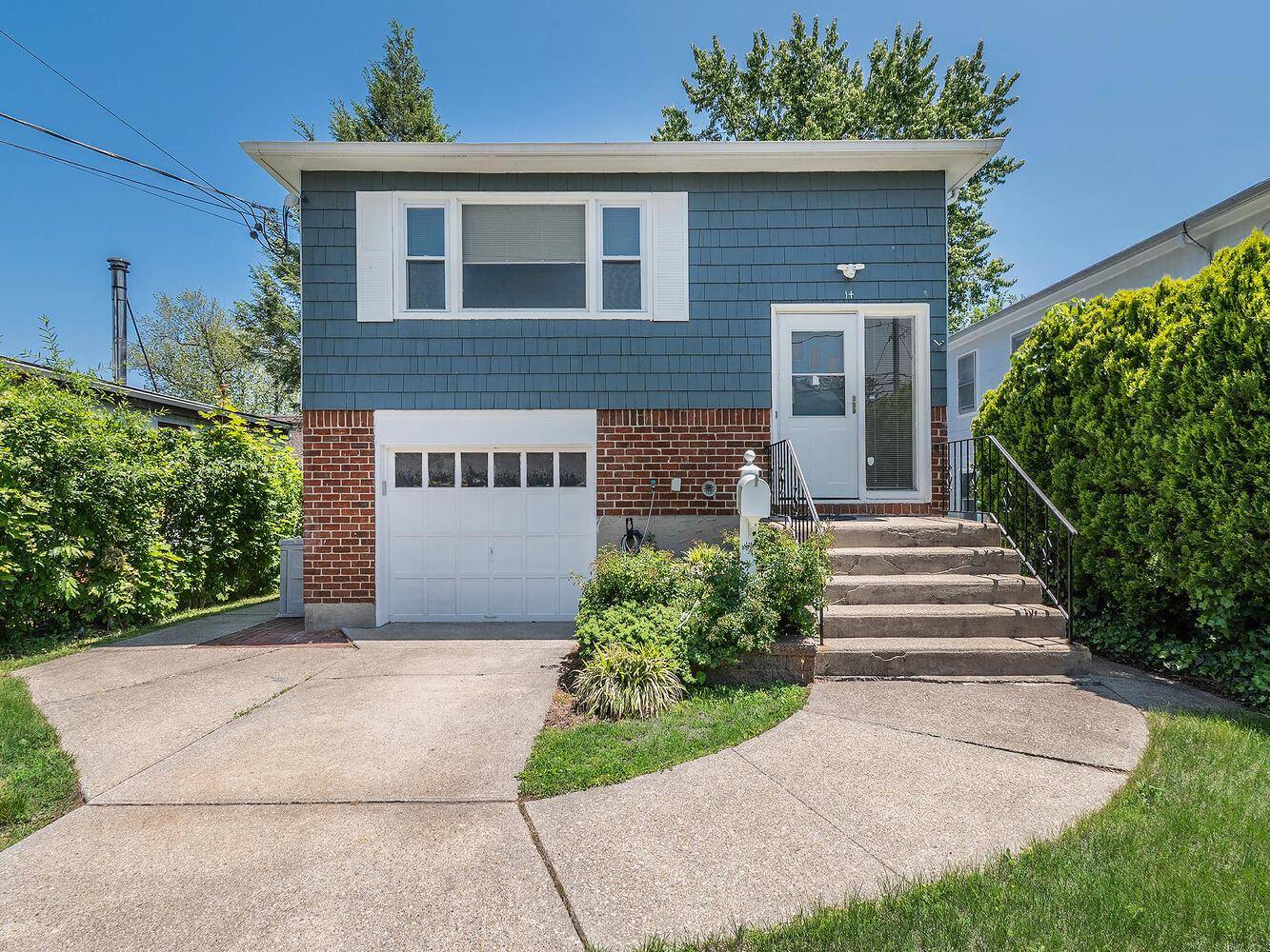 Welcome to this bright and sunny hi ranch with 3 bedrooms and 2 full baths in the Orchard Beach section of Port Washington.