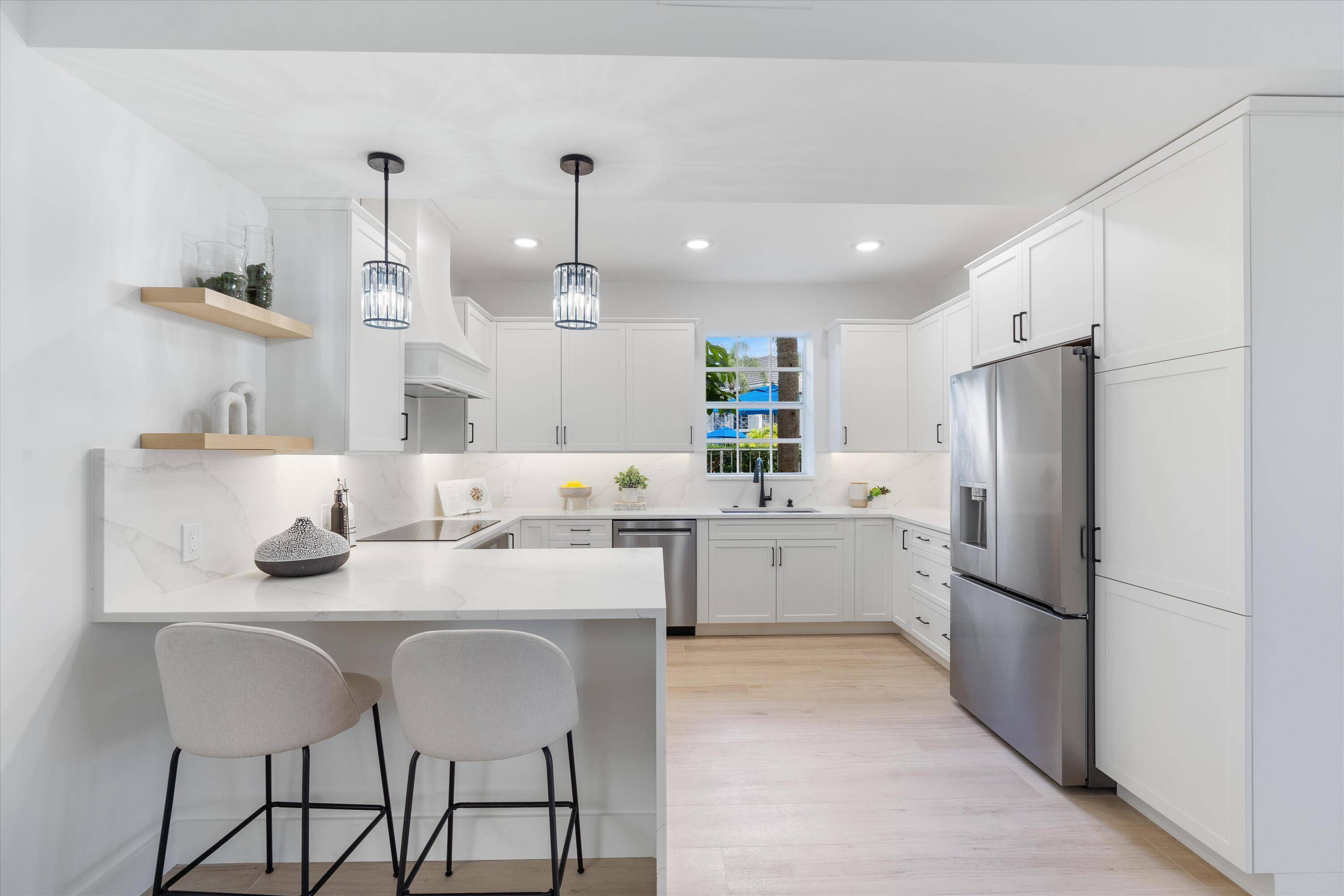 Discover a refined take on modern living in this fully renovated first floor condo, where every detail has been thoughtfully curated for style, comfort, and ease.