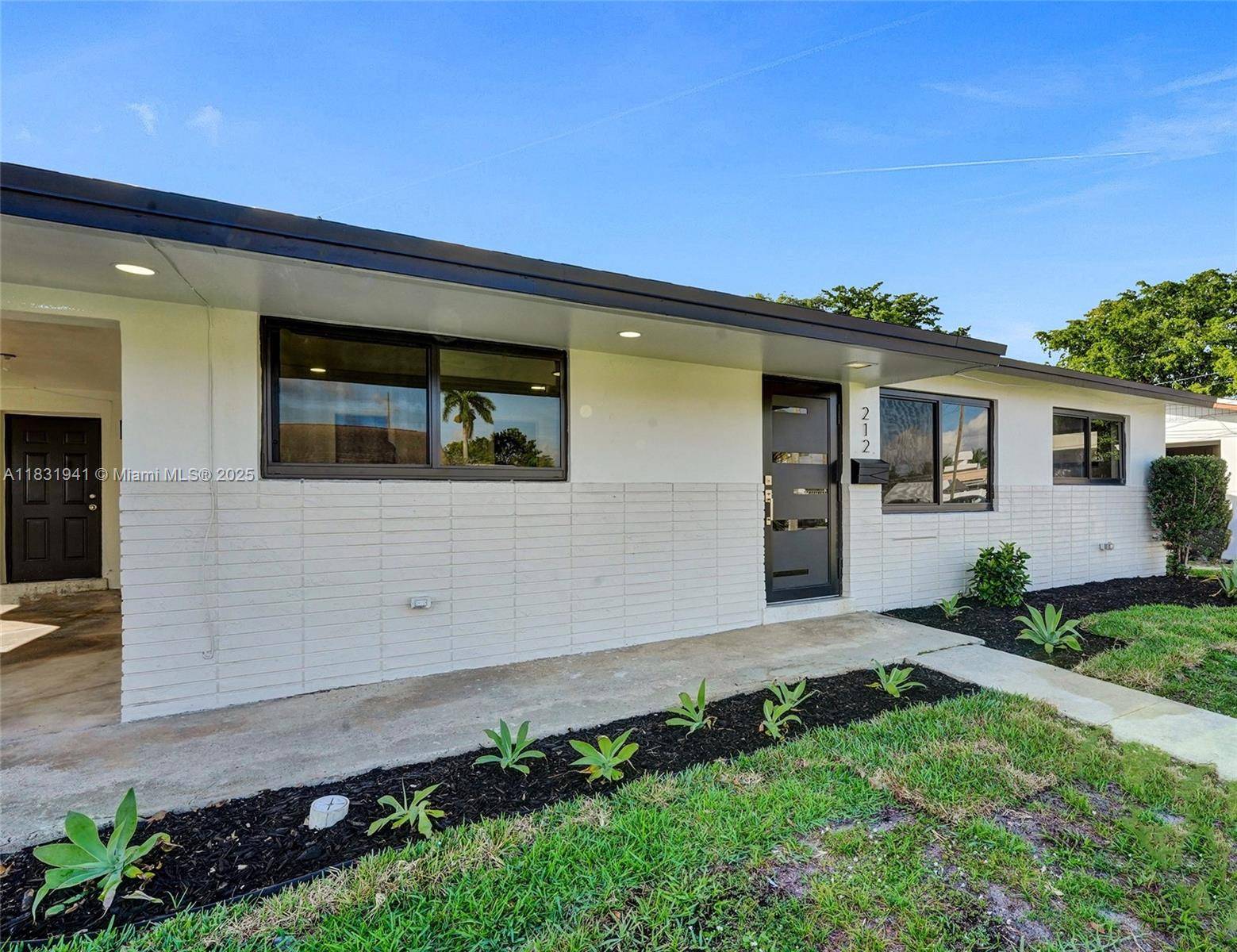 Experience lakefront living in this beautifully upgraded 3BD 2BA home featuring porcelain tile floors throughout.