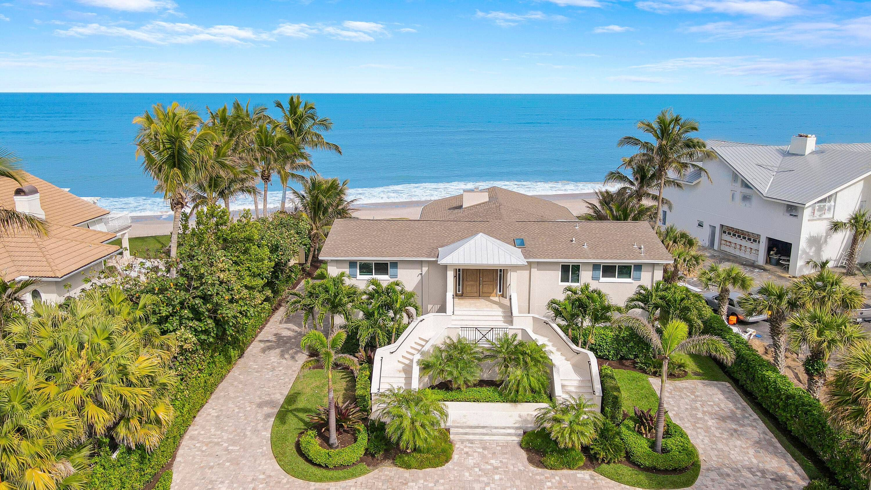 Experience oceanfront living at its finest with this beautiful home in the quiet, beachside town of Indian River Shores.