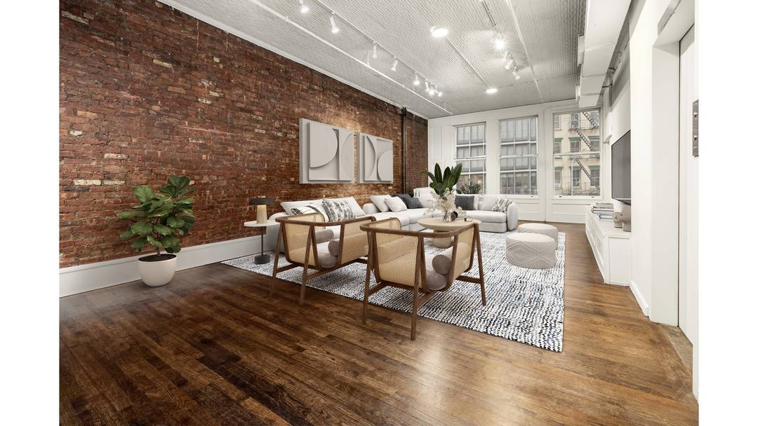 2, 000 square feet of classic SoHo loft living at the corner of West Broadway and Grand Street.