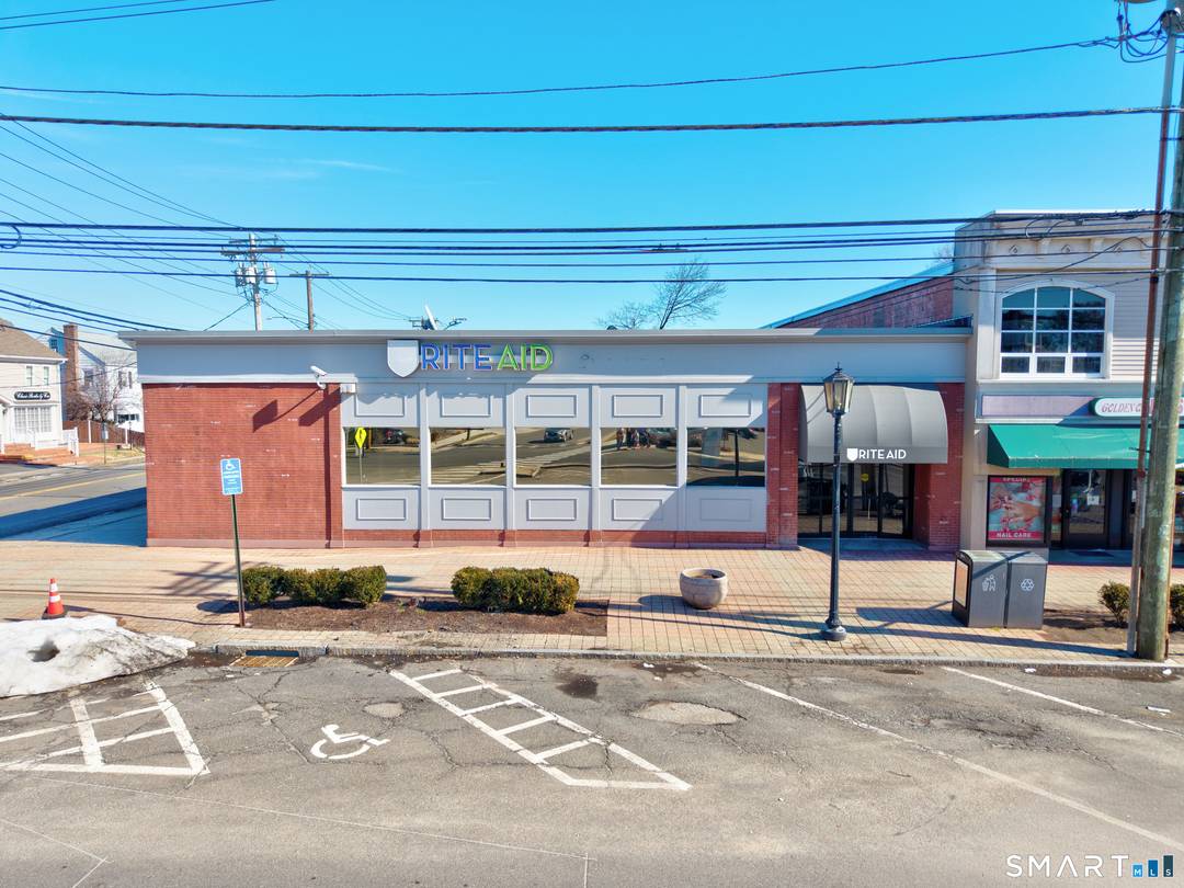 An exceptional opportunity to acquire or lease a highly visible commercial building located at 3680 Main Street in Stratford, Connecticut, formerly occupied by a Rite Aid pharmacy.