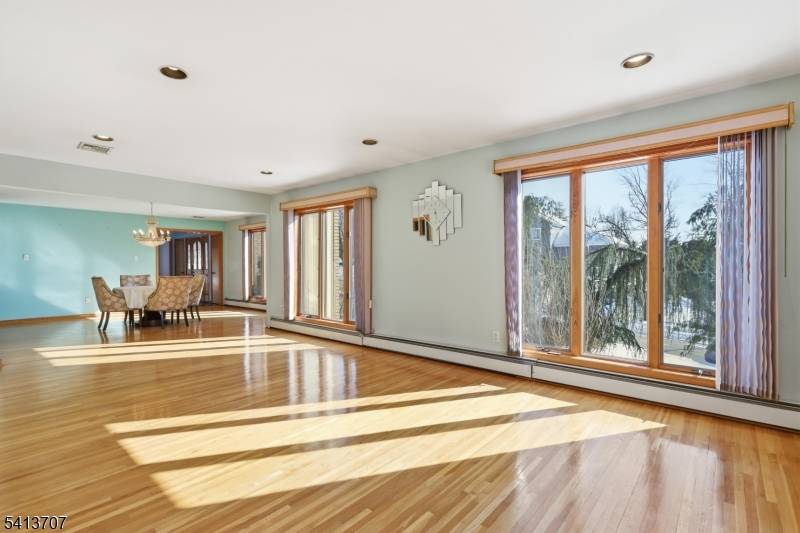 Welcome to 32 Sylvan Drive, an exceptional residence in prestigious Windsor Woods neighborhood.