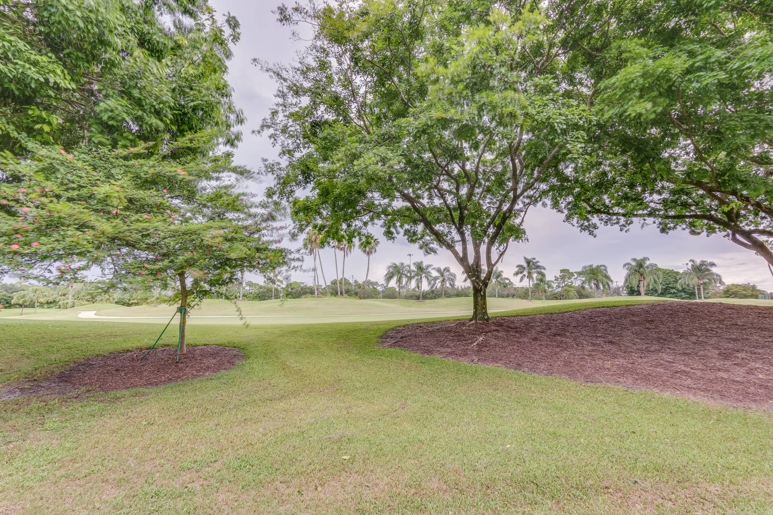 Known for the beautiful sunrises, you'll wake up to plus enjoy the rolling golf course views.