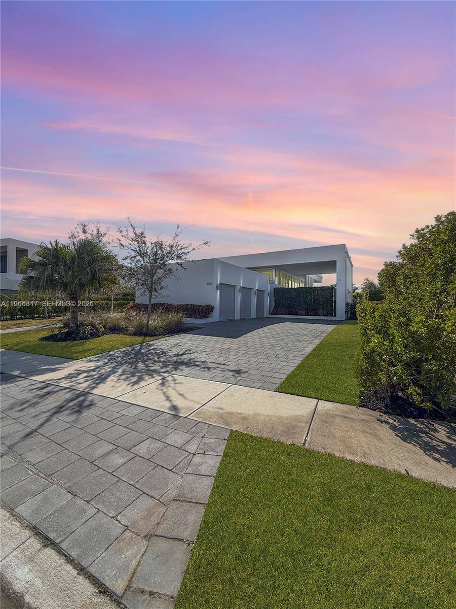 Live in luxury in this spectacular single story residence located in the exclusive gated community of Botaniko Weston.