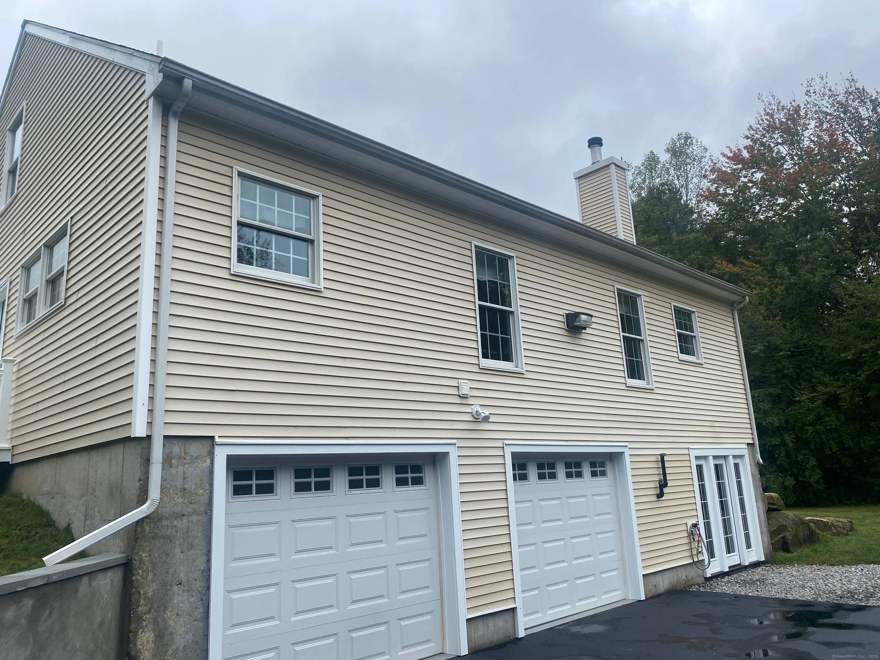 Nestled on 2. 6 private acres, this mint condition 1, 900 sq.