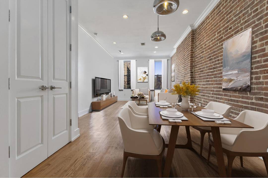 Experience luxurious penthouse living in an elegant boutique brownstone at 506 East 119th Street.