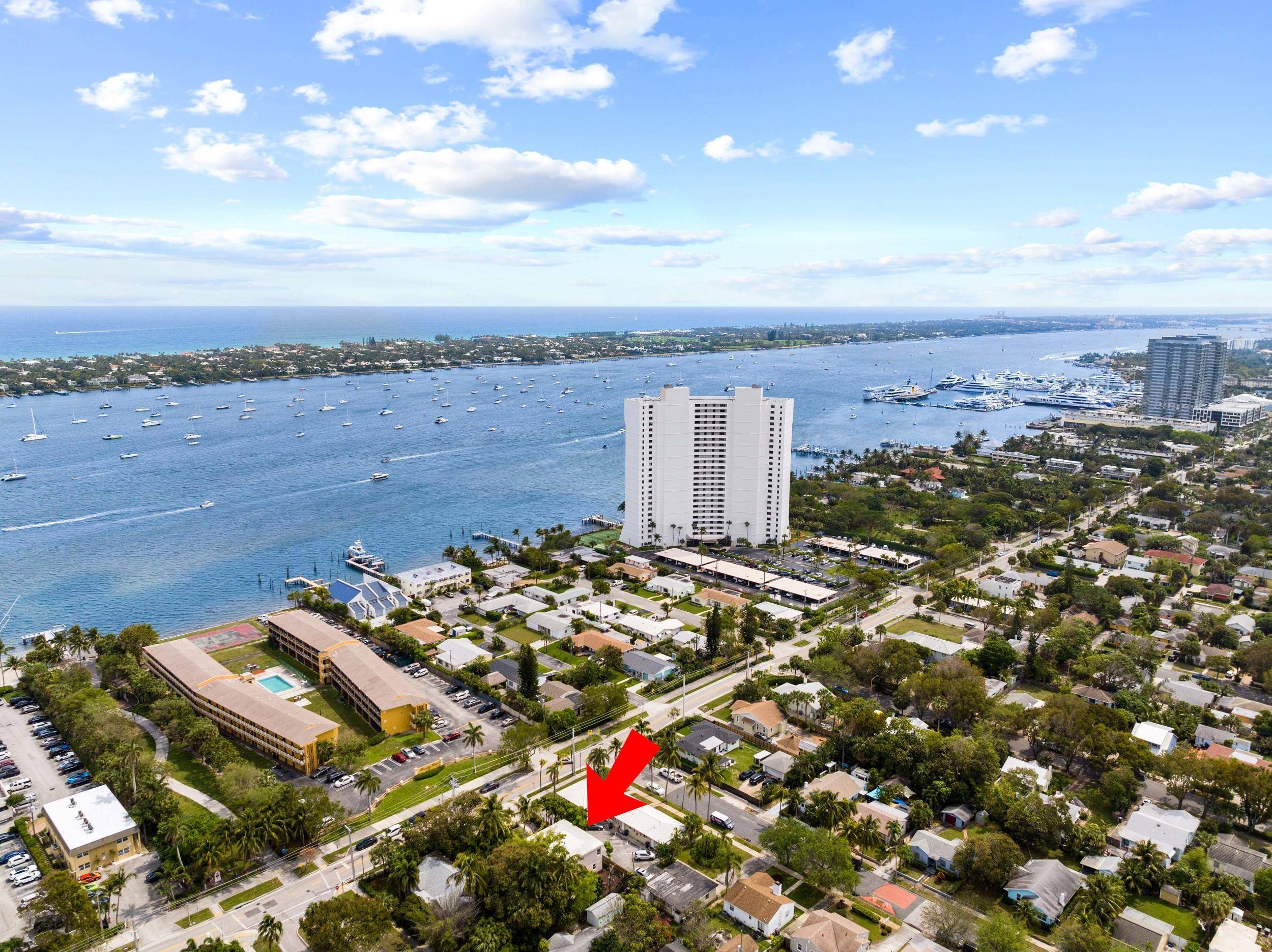 Dazzling Intracoastal Water Views from your large private balcony and large fenced in backyard at this North Flagler oasis.