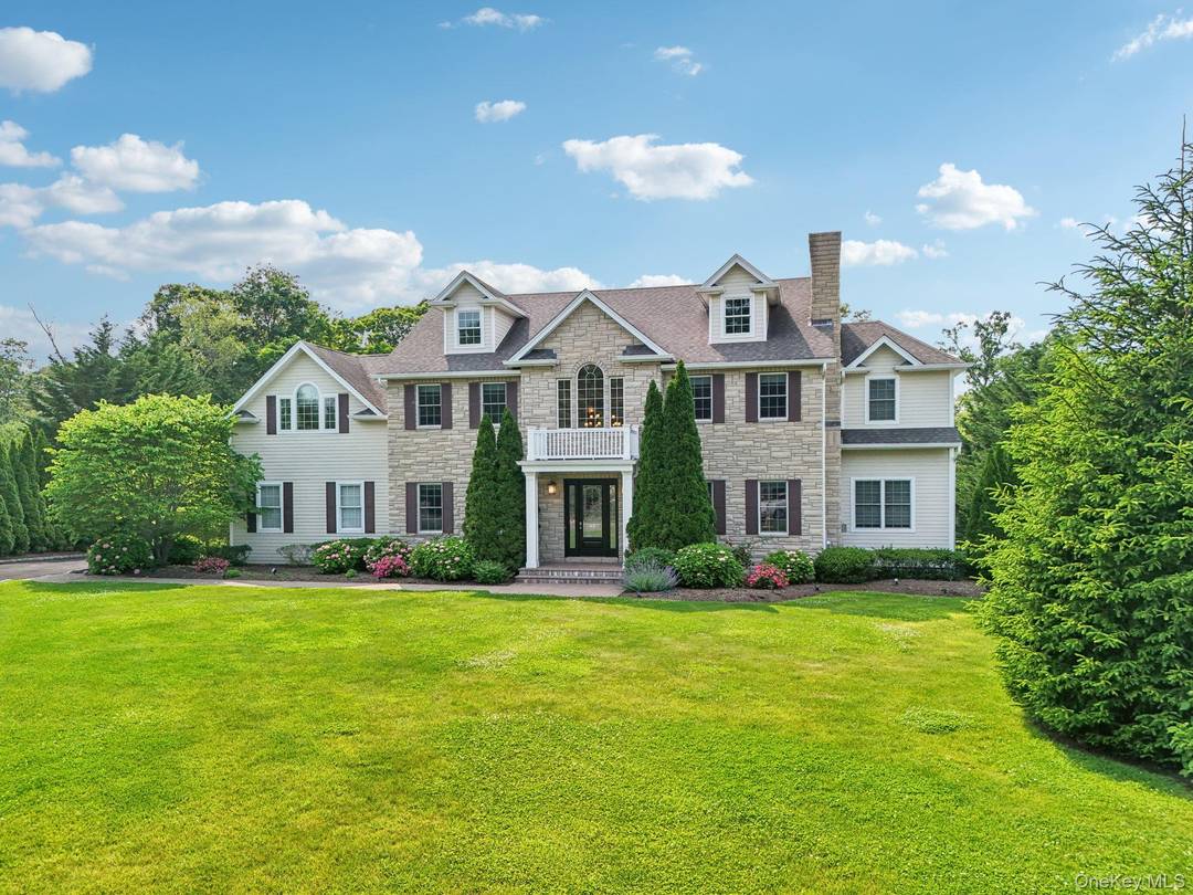 Impeccably Maintained Inside and Out Welcome to this stately and sophisticated 6 bedroom, 5.