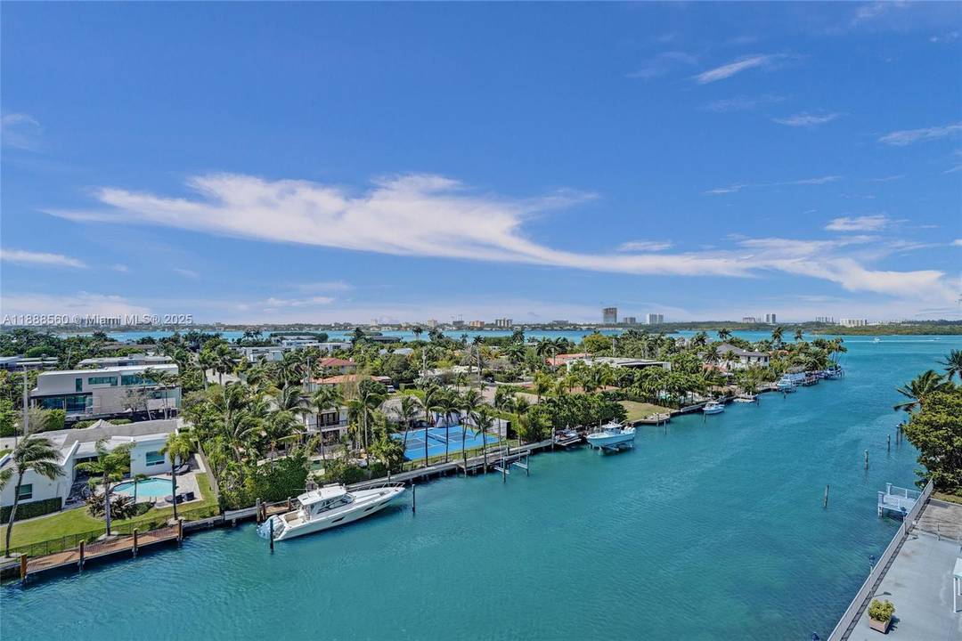 Elevated penthouse living with sweeping Biscayne Bay views in the heart of Bay Harbor Islands.