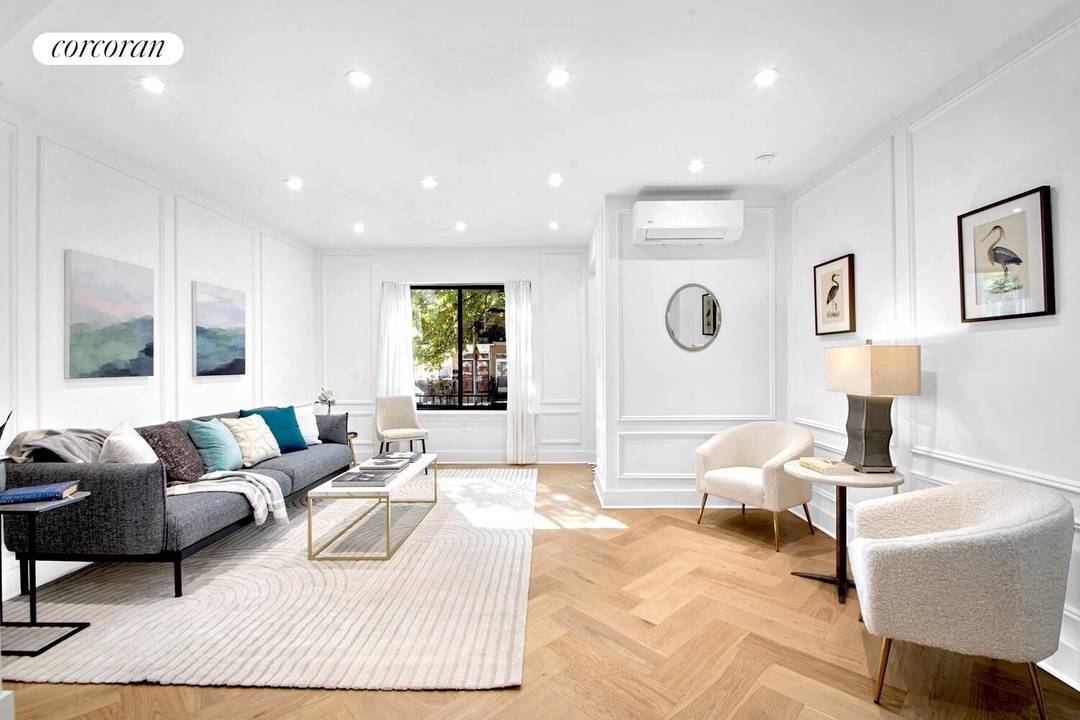 Welcome home to 87 Sherman Street a fully renovated two family townhouse with parking on idyllic Sherman Street !