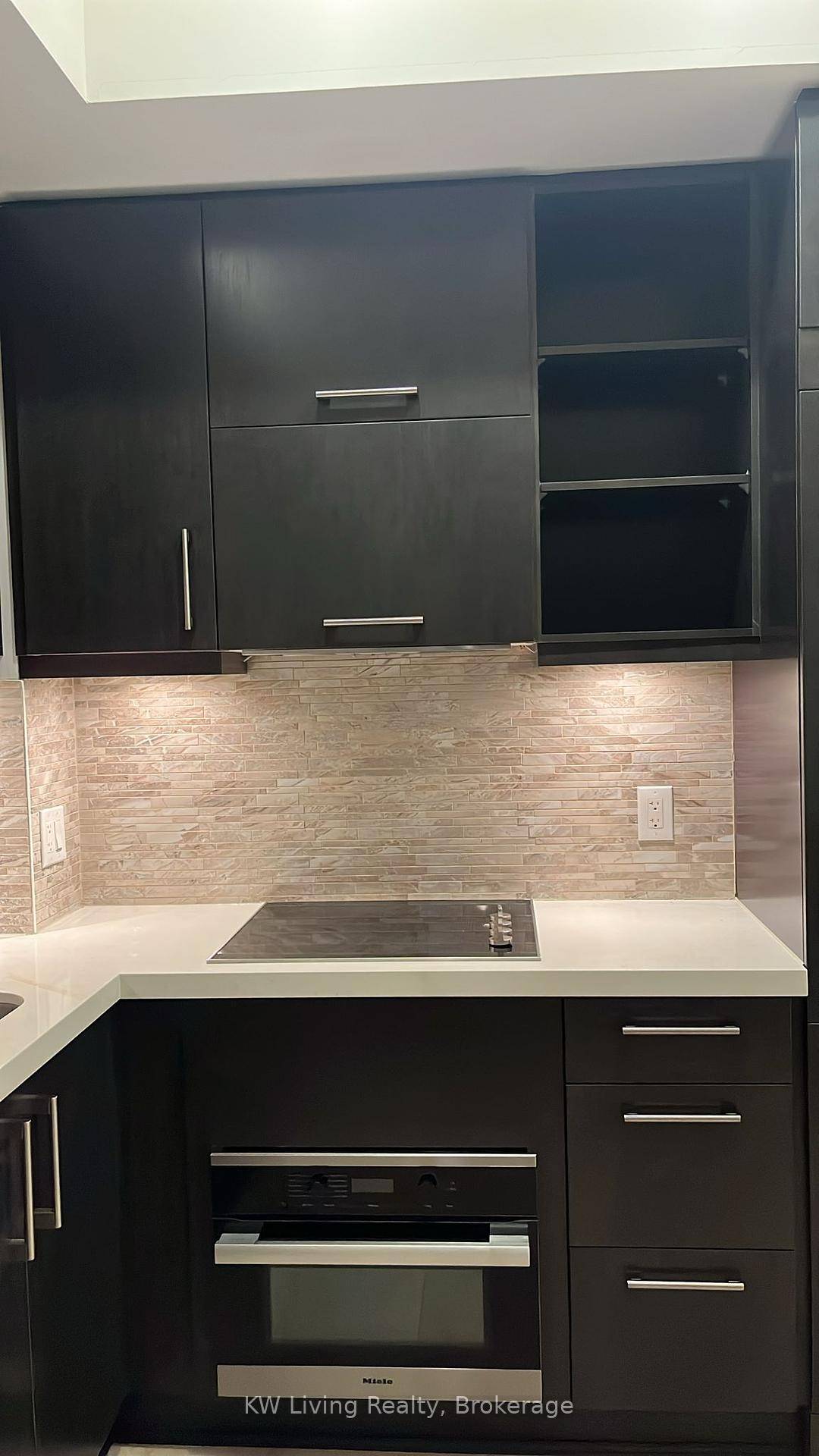 Bright bachelor unit at U Condo on Bay Street just steps to U of T, subway, and Yorkville.