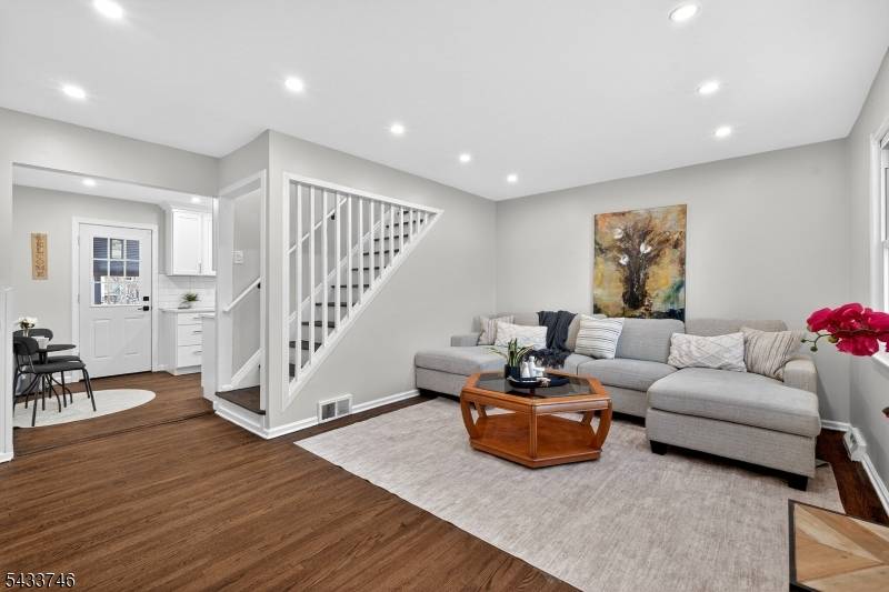 Welcome to 5 Lois Avenue in East Brunswick, a fully remodeled Cape Cod that delivers far more space and impact than you would expect at first glance.