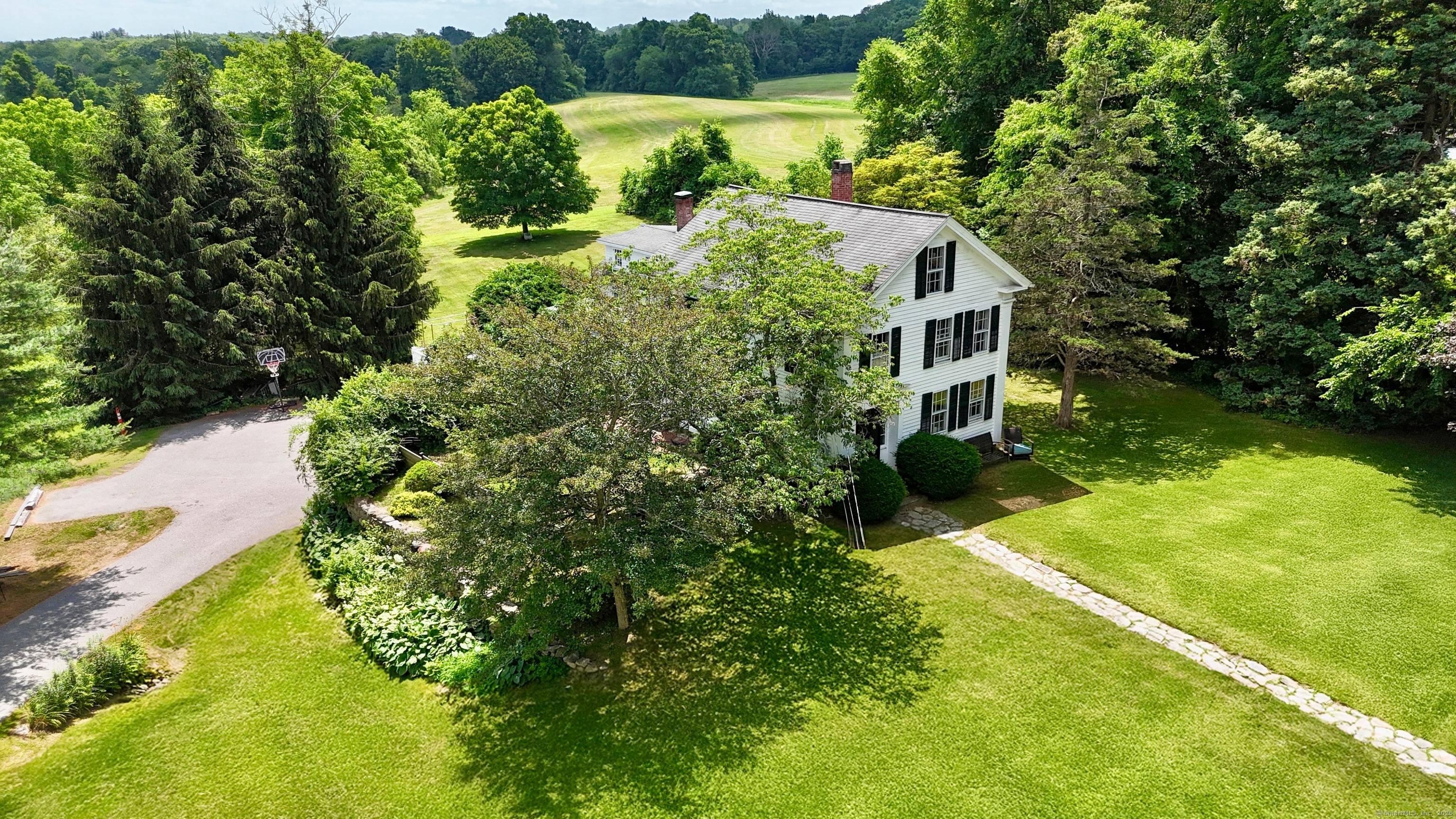 Welcome to this beautiful idyllic colonial, sitting off of Woodstock Hill !