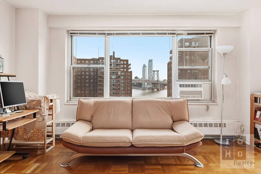 Elevated Living Balcony, Views amp ; Space on the 15th Floor Perched on the 15th floor, this renovated two bedroom home offers open views of the East River, the Williamsburg ...