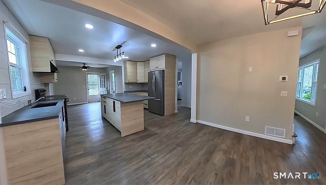 Welcome to 1 Mayflower Court a fully renovated colonial on a quiet cul de sac corner lot in one of Milford's most sought after beach neighborhoods.