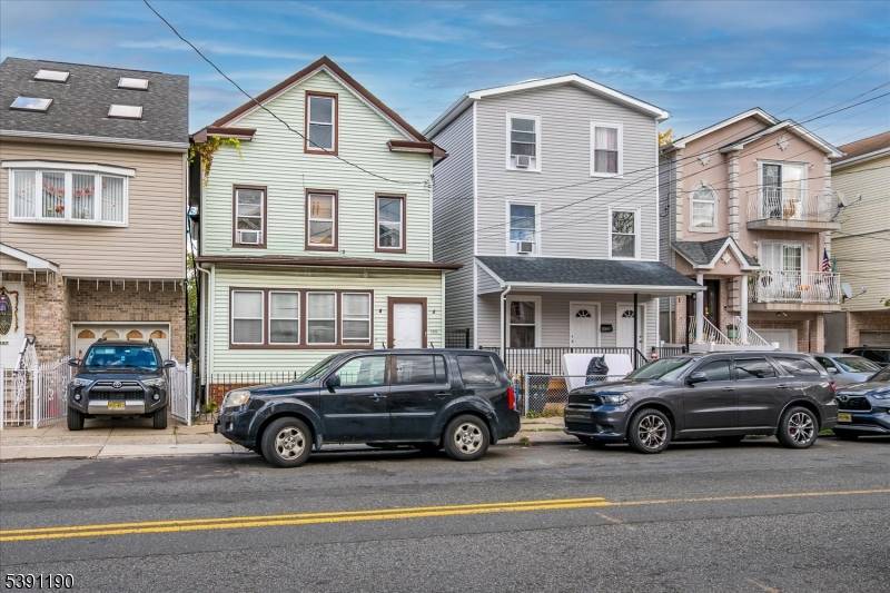 Great income maker 2 unit colonial style property with a finished attic and a basement.