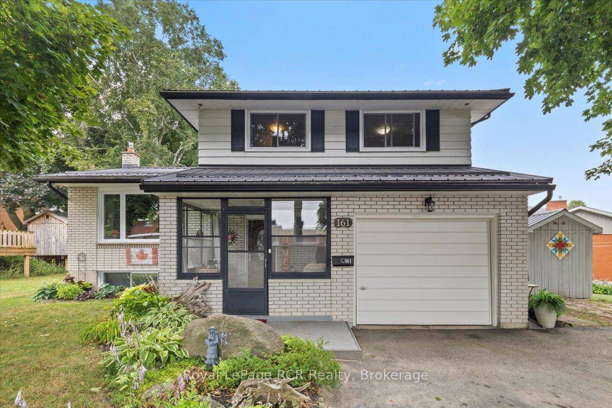 Charming Curb Appeal on Corner Lot with Countless Updates.