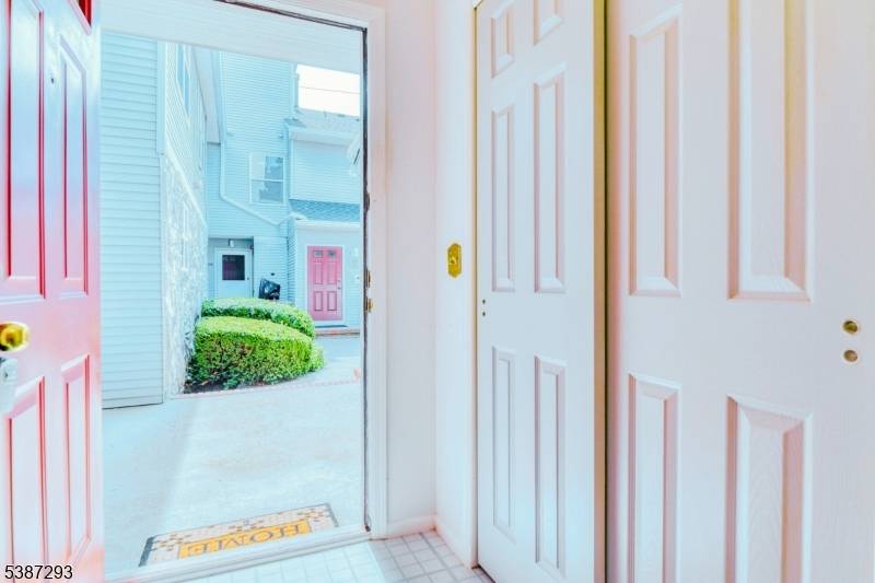 Welcome to this inviting 2 bedroom, ground floor condo that combines the ease of single level living with a townhouse like feel.
