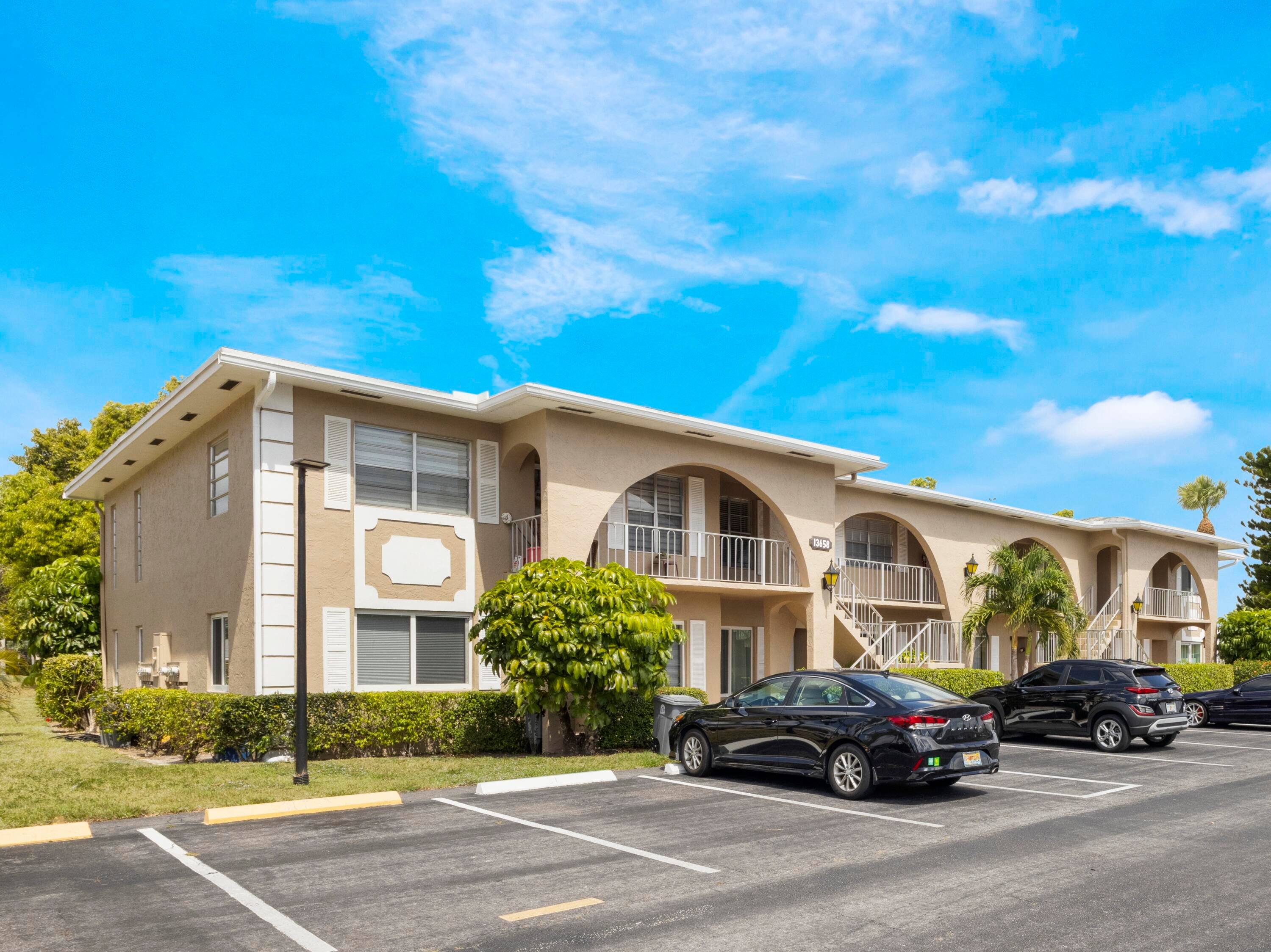 Enjoy comfortable living in this spacious ground floor 2 bedroom, 2 bath condo featuring impact windows and an unobstructed view of a large common area.