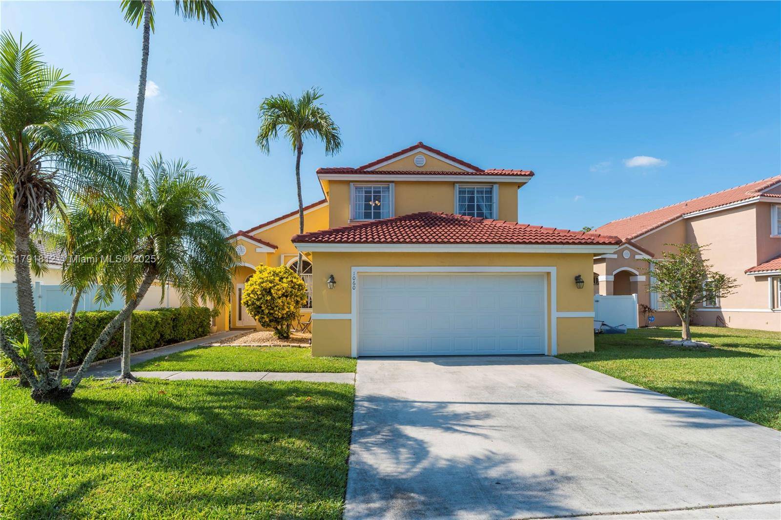 Move in ready lakefront pool home in Chapel Trail with resurfaced pool, screened patio, fire pit, pavers, and outdoor shower perfect for entertaining.
