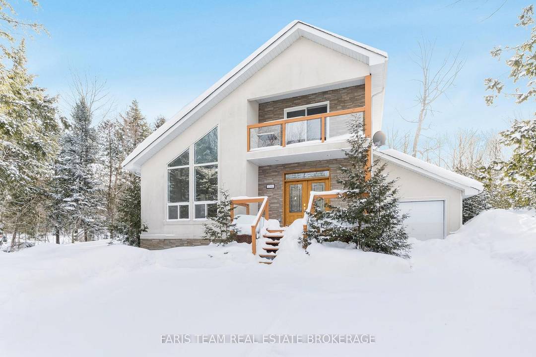 Top 5 Reasons You Will Love This Home 1 Custom built and bathed in natural light, this welcoming four season home offers a bright, open concept design that invites easy ...