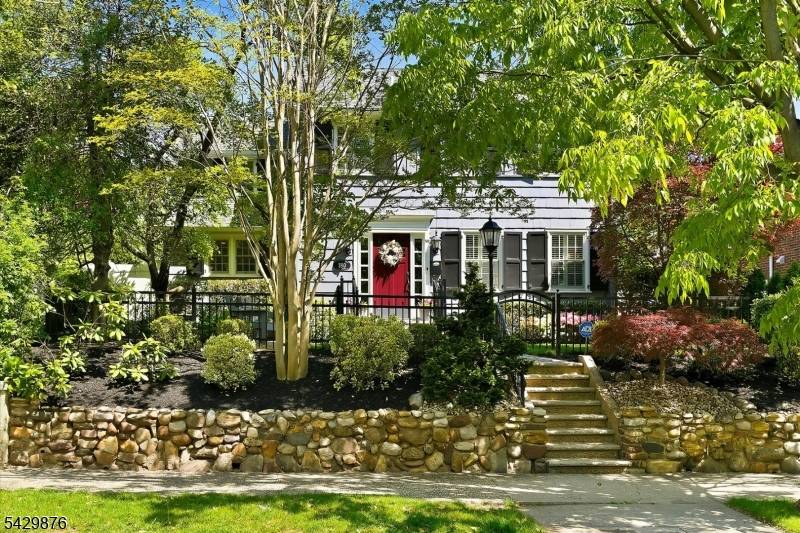 This beautifully renovated 1930s Colonial Revival blends timeless elegance with modern comfort.
