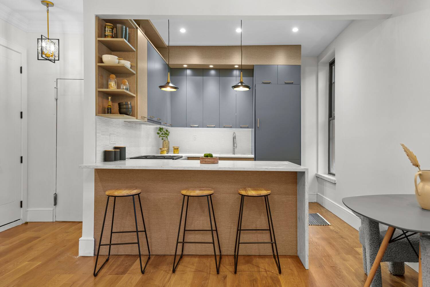 Step into this beautifully renovated 2 bedroom 1 bath home located on the second floor of an intimate pre war walk up.