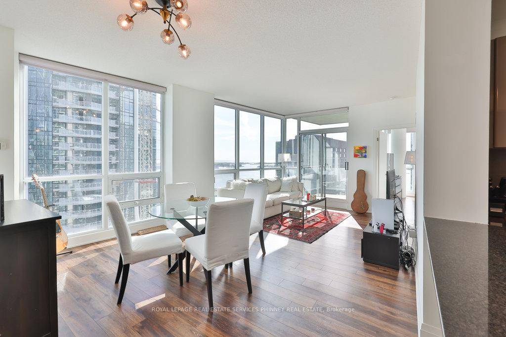 Welcome to 1059 sq. ft. of bright, spacious living with panoramic lake and city skyline views.