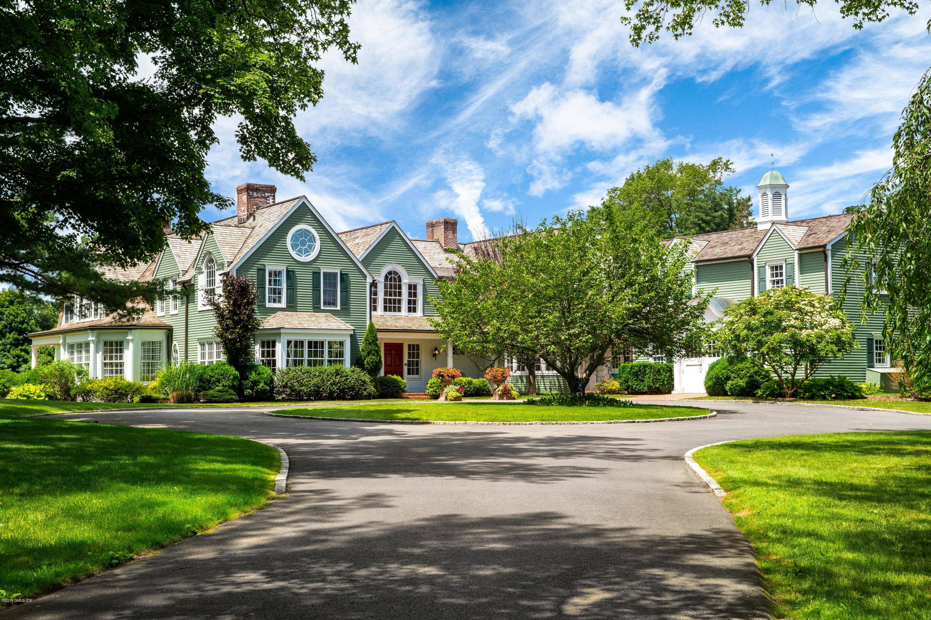 Enjoy 6. 13 parklike, private acres on Clapboard Ridge Road in the heart of Mid Country Greenwich and the RA 2 zone.