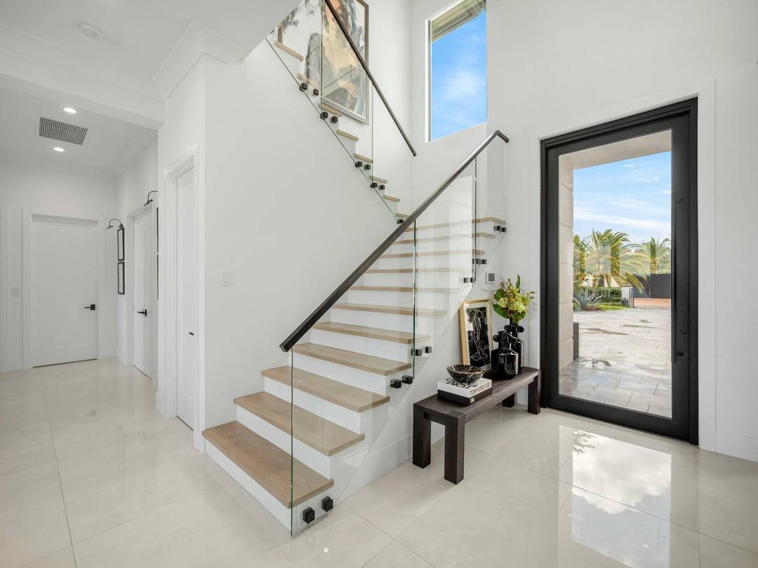 Priced to SELL. Tucked away at the end of a quiet cul de sac along the widest part of the Loxahatchee River, this newly built estate redefines luxury living in ...