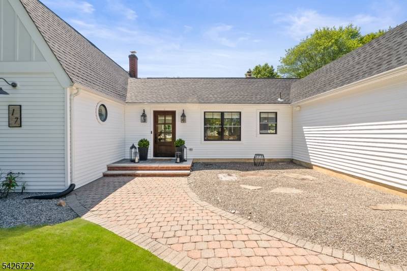 A classic farmhouse with a distinctly modern twist, this exceptional home offers an open concept first floor anchored by a spacious living and dining area, a luxurious primary suite with ...