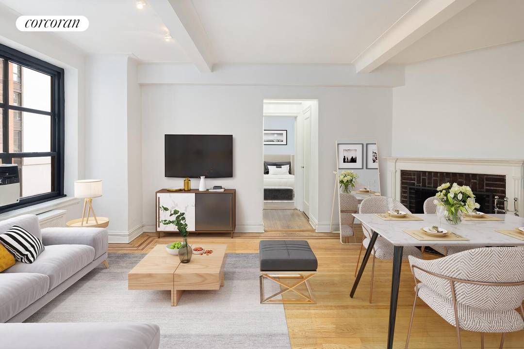 A beautiful and charming pre war one bedroom with wood burning fireplace and open kitchen in the sought after Gramercy House.