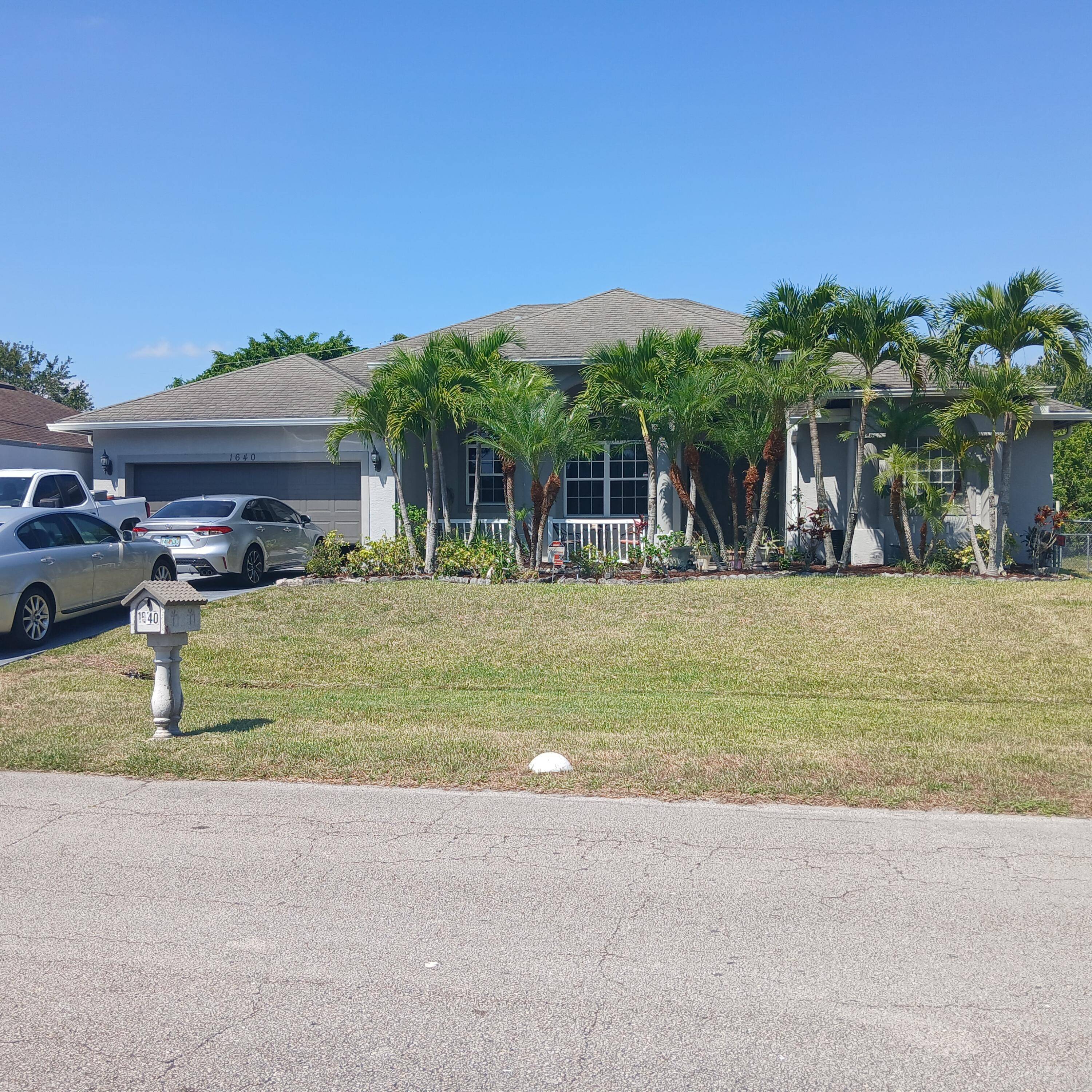 This amazing single family home sits on a quiet street of Port St Lucie neighborhood, just a couple blocks from shopping, dining, parks, churches also with an easy commute to ...