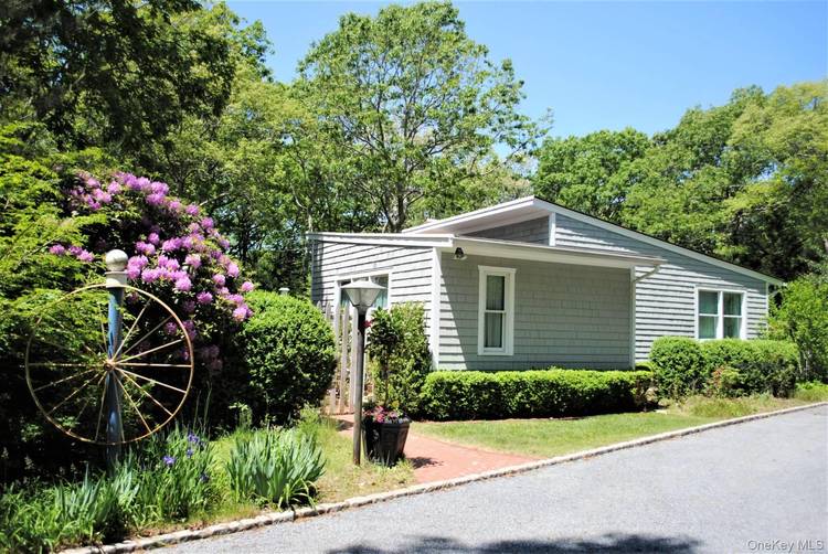 Located just over a mile from the heart of East Hampton Village, this stylish contemporary home offers the perfect blend of privacy and proximity to restaurants, shops, and beaches.