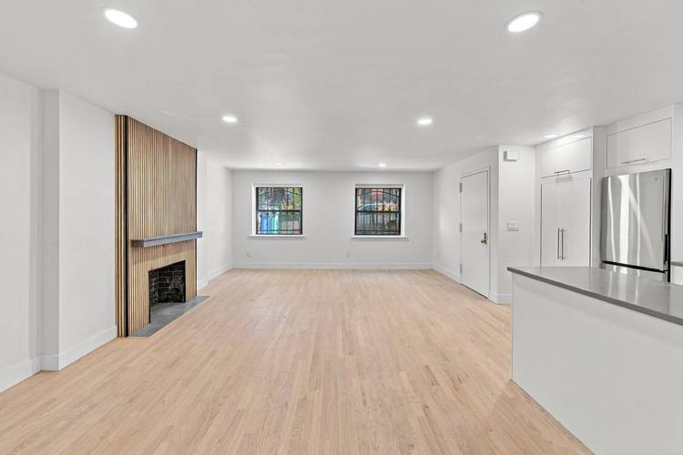 Brand new from top to bottom, this gorgeous garden apartment features two spacious bedrooms, a beautifully renovated bathroom with a double shower, and a large entryway.