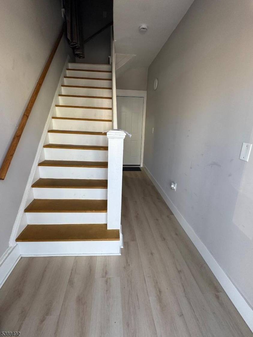 Beautifully renovated two family home in North Newark, fully rented and income producing.