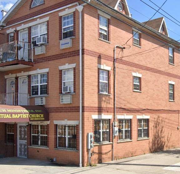 Spacious and well maintained large corner property, currently featuring a church on the first floor, a three bedroom, three bathroom apartment on the second floor, and a three bedroom, three ...