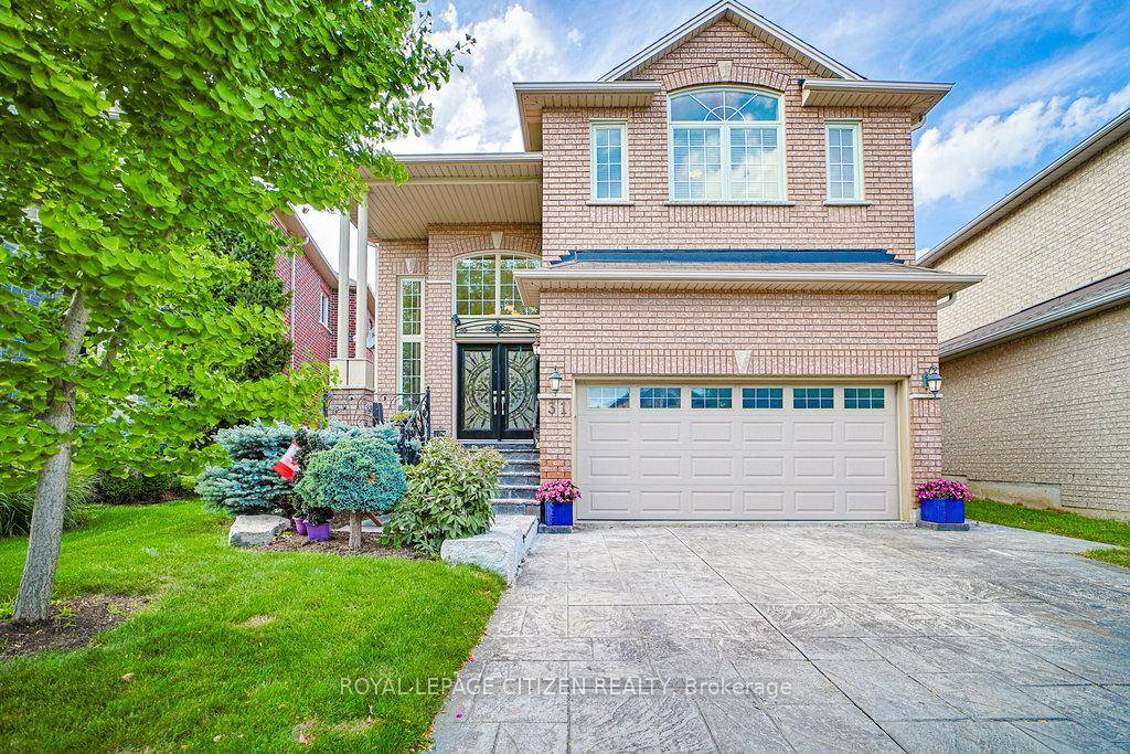 ! ! STUNNING FAMILY HOME on a QUIET STREET in PRIME MAPLE !