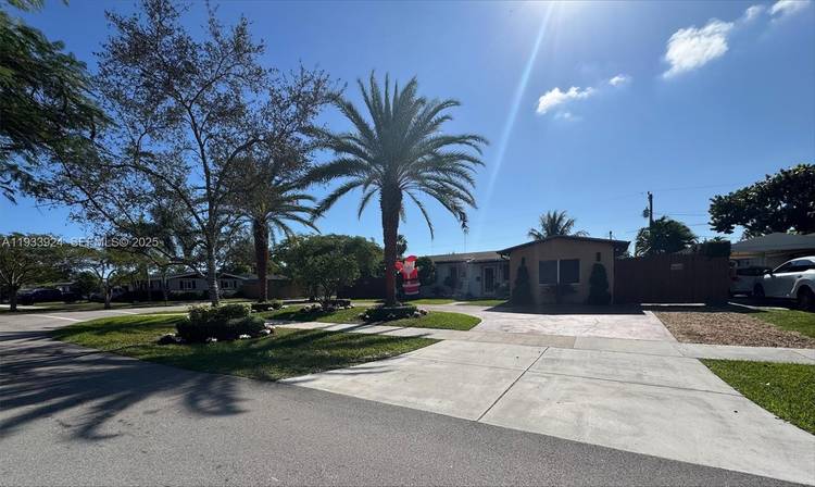 Stunning remodeled 3 bedroom, 2 bath pool home featuring an open concept layout on a spacious corner lot in the heart of Cutler Bay.