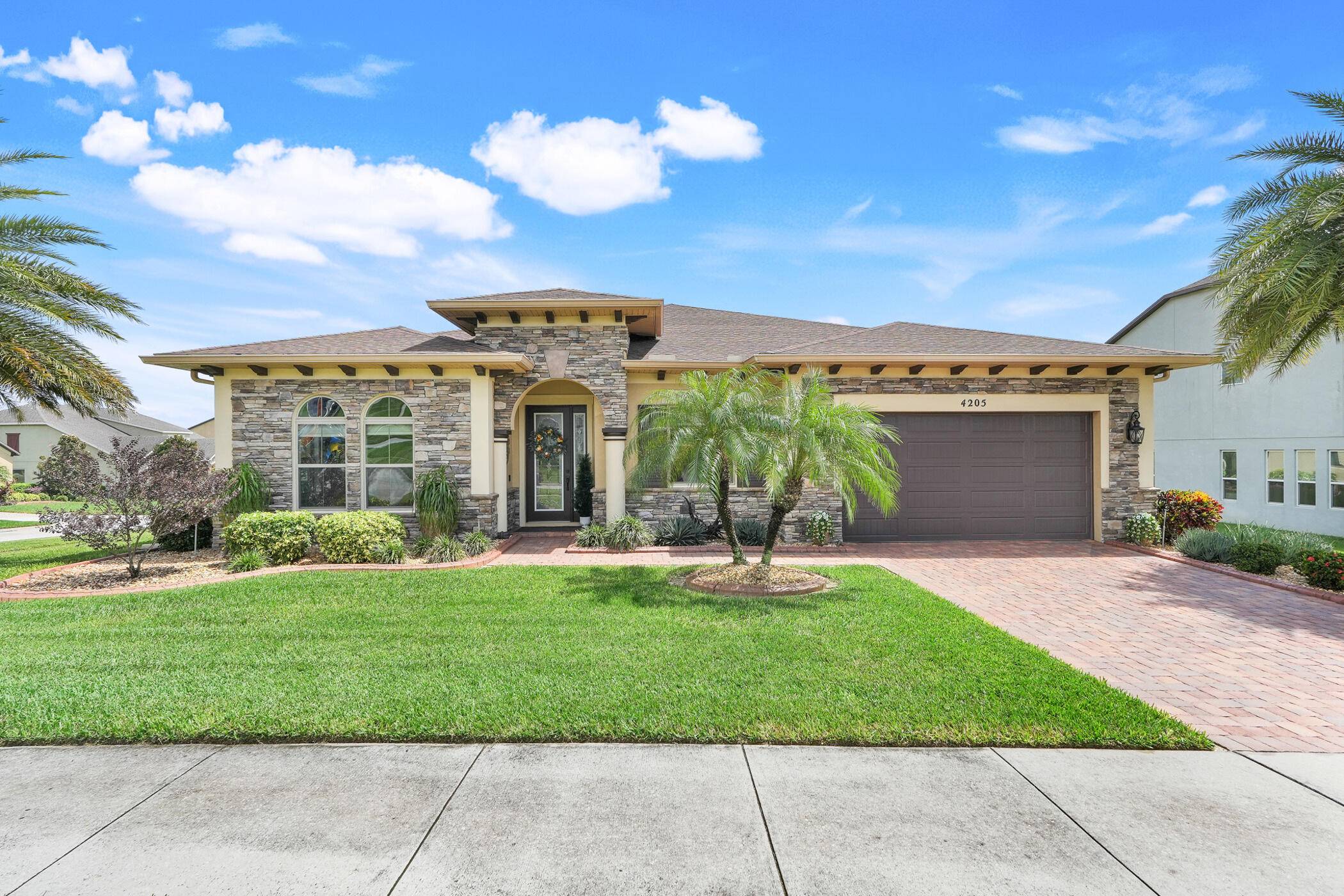 Immaculate 3BR 2. 5BA ranch home on a corner lot in gated Hunter's Run !